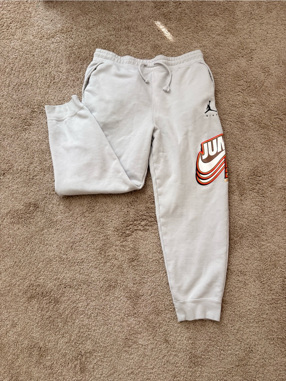 Jordan Sweatpants with Orange & Black Graphic